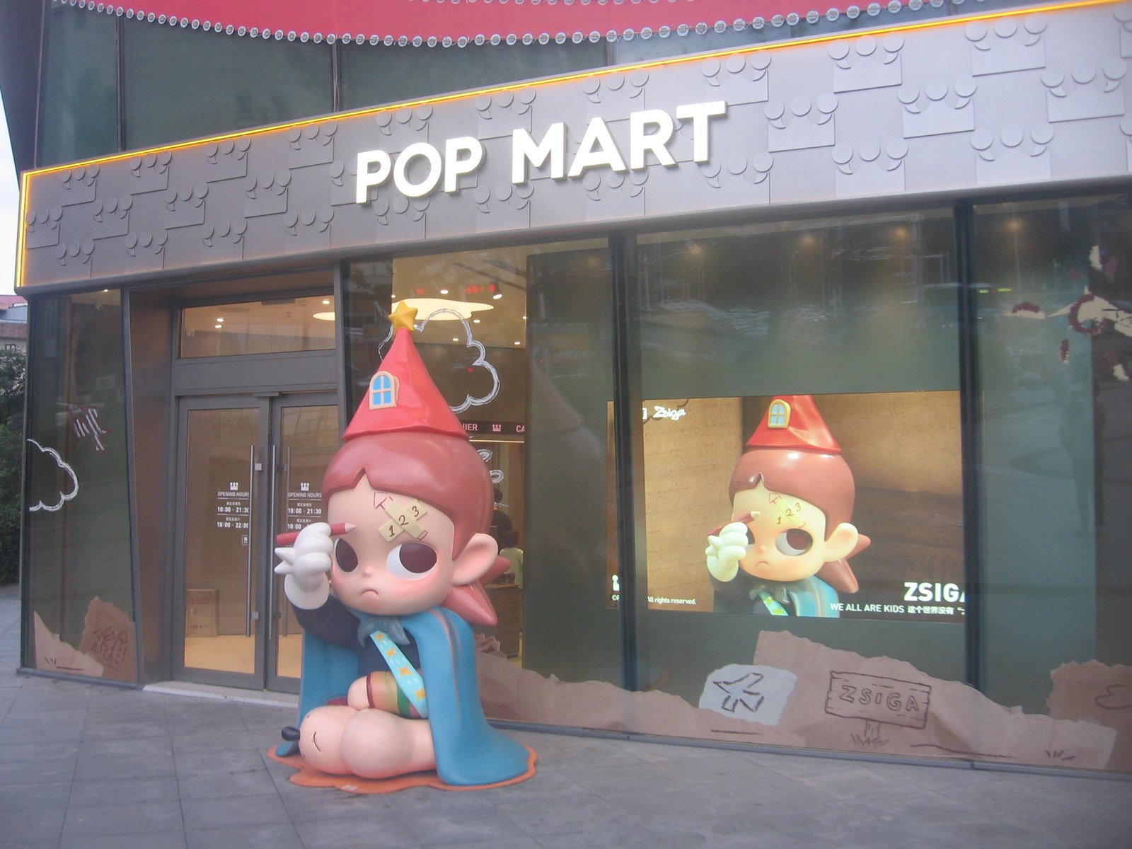 POP MART storefront with character displays in Zhenjiang